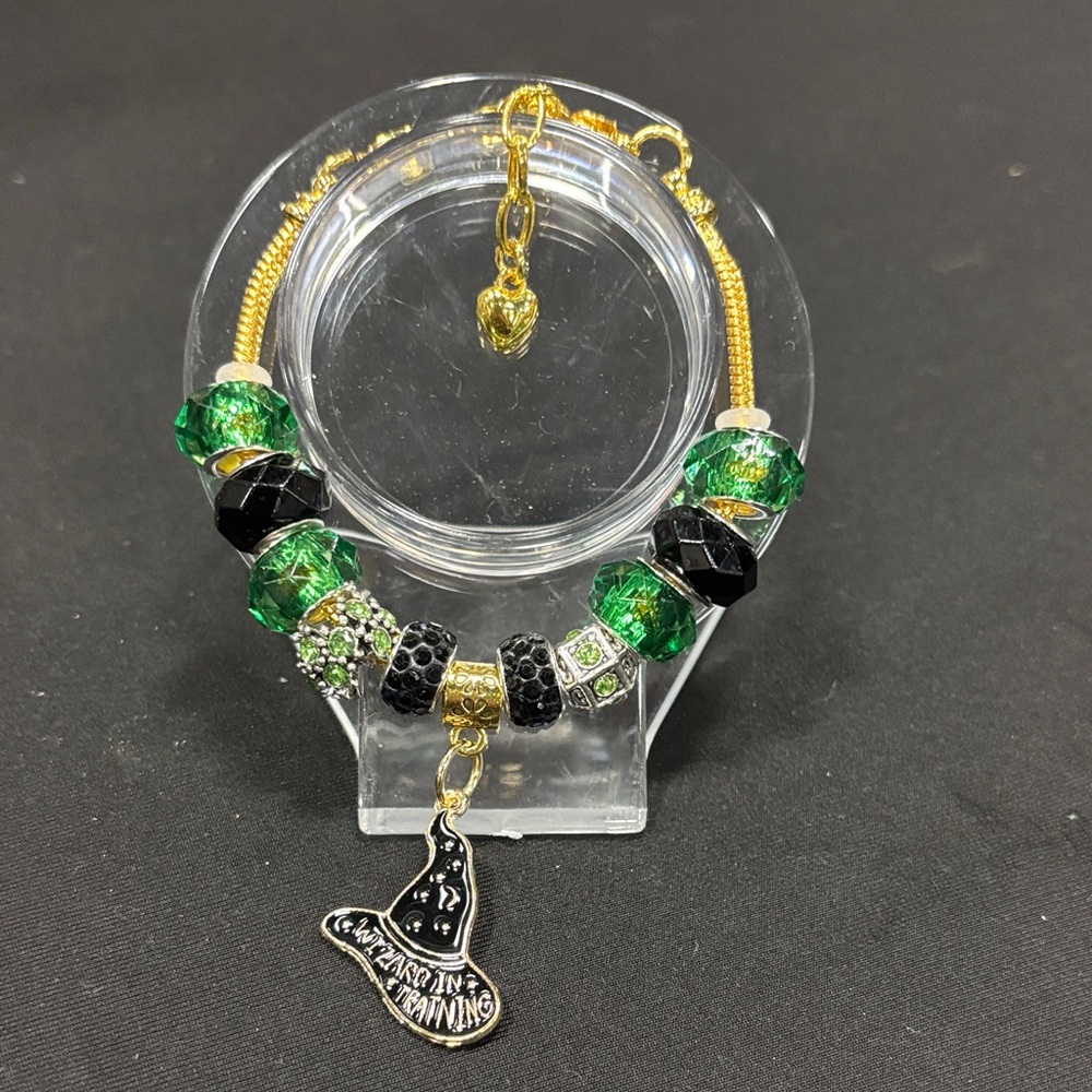 Elegant Gold and Green Wicked Charm Bracelet